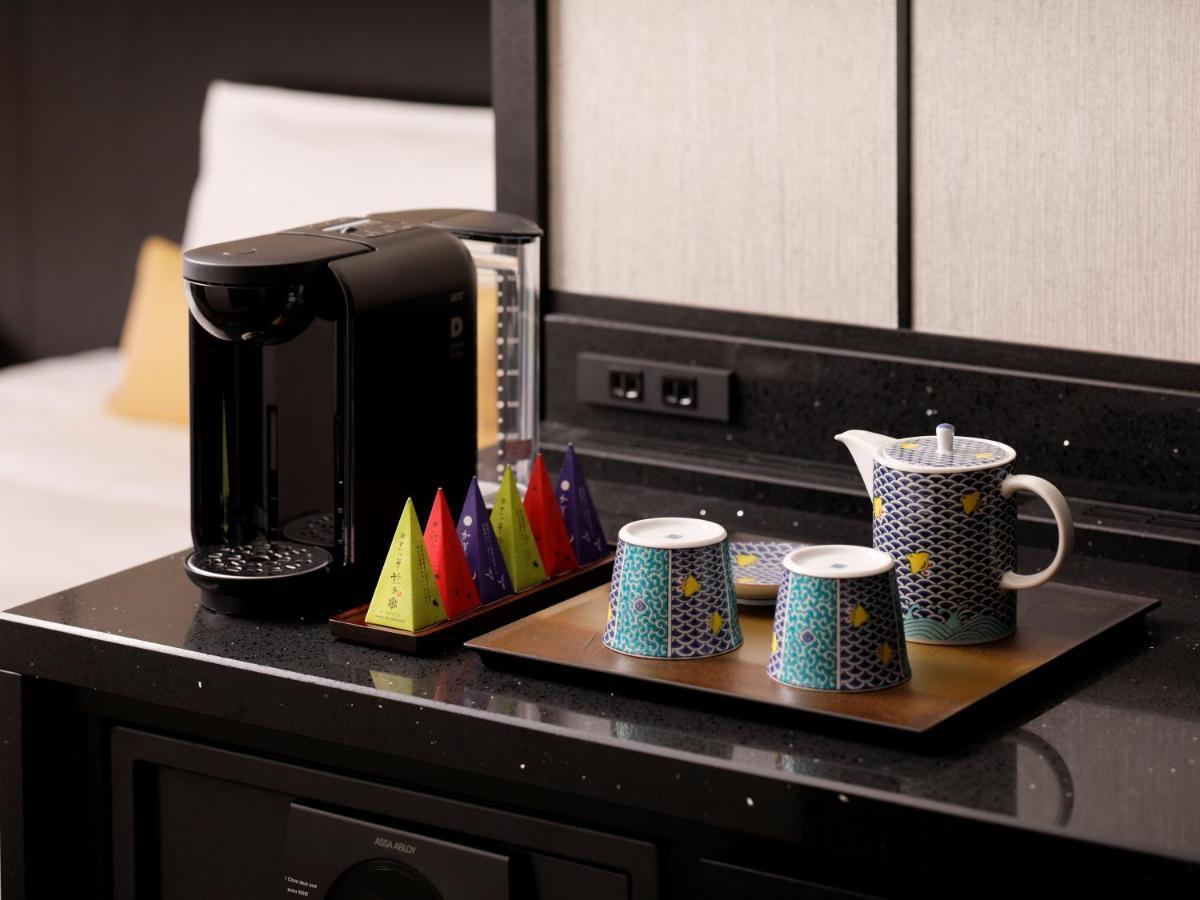 The Hotel Sanraku Kanazawa 21Th December 2022 Open Exteriér fotografie A Nespresso coffee machine in a hotel room